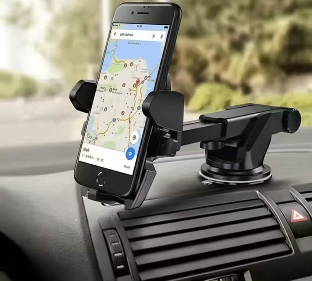 Phone mounted on a car dashboard with a GPS app displayed